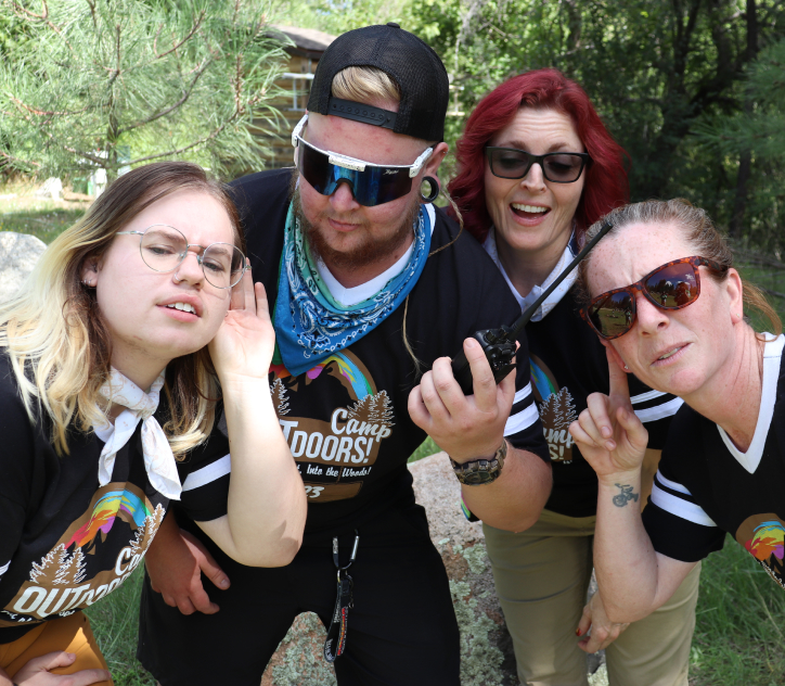 Camp Outdoors volunteers wearing matching black t-shirts