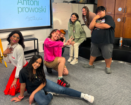 Group of teens posing after a successful performance