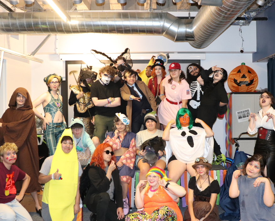 Group of LGBTQ teens and young adults dressed up for Halloween