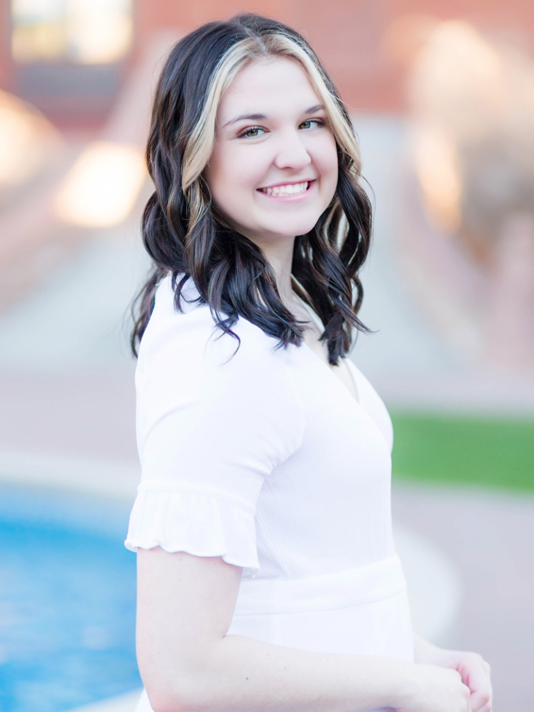 Camryn Mayhew, She/Her